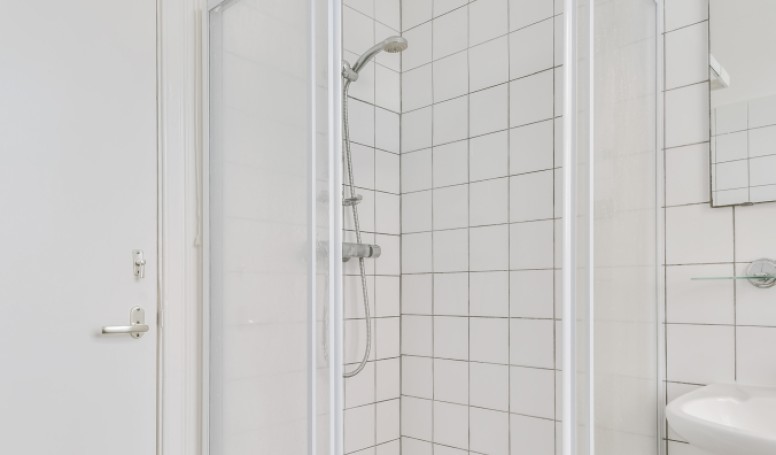 Sliding doors for shower enclosures
